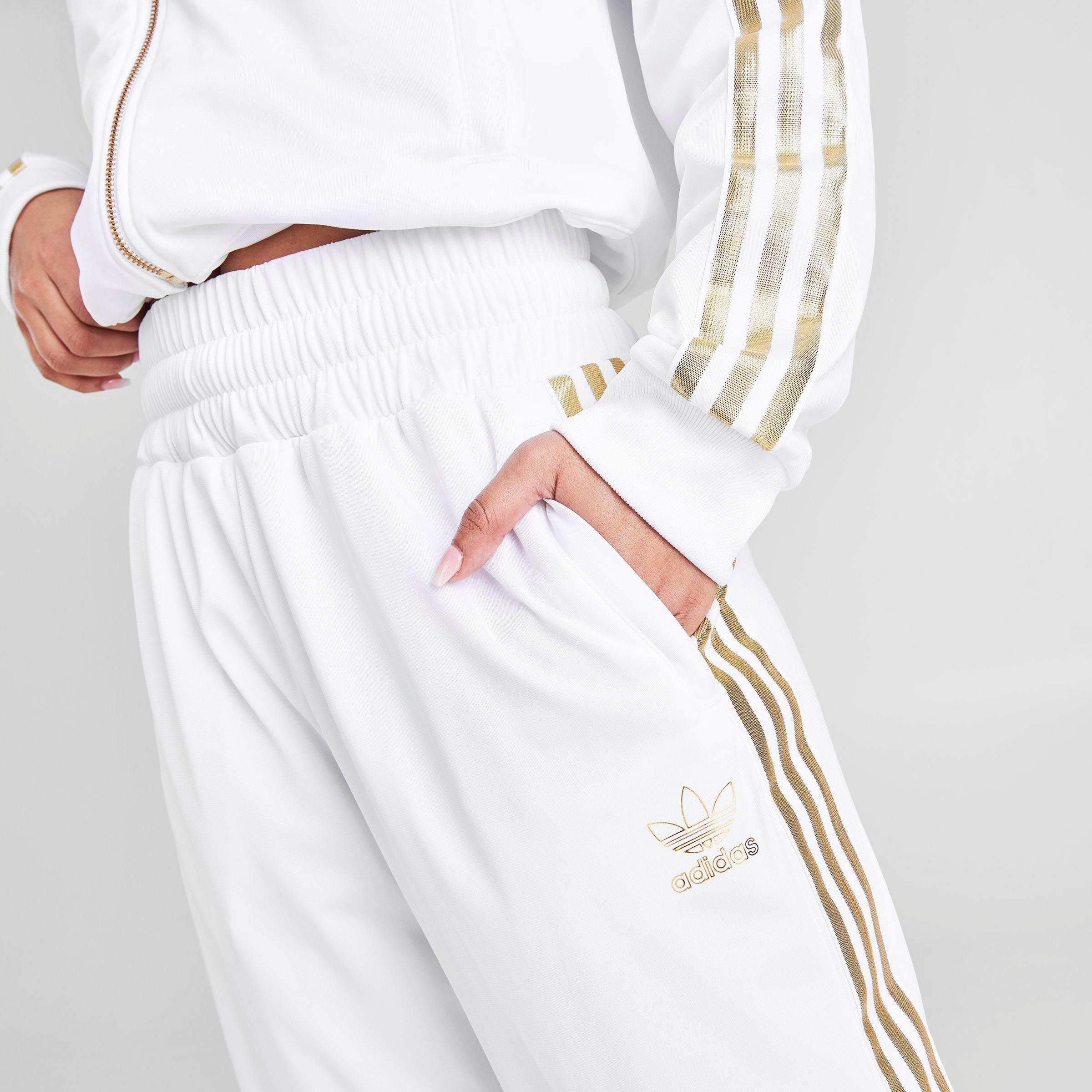 white and gold adidas track pants