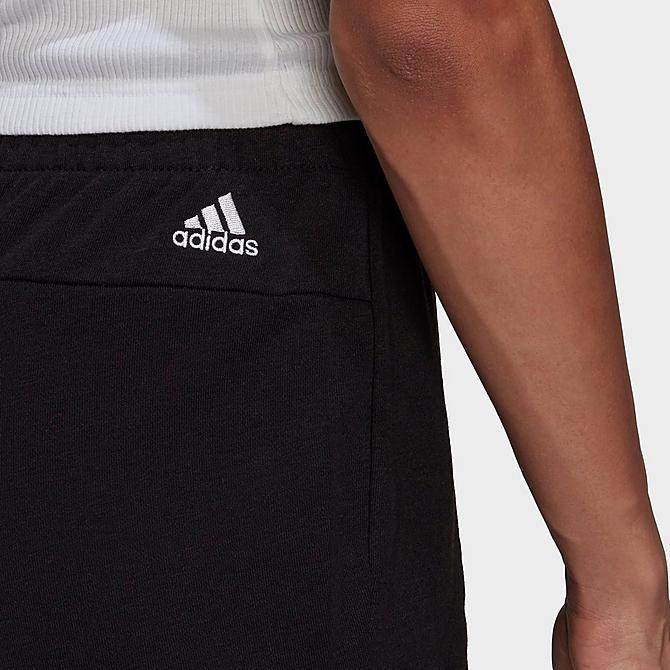 On Model 5 view of Women's adidas Essentials Slim Logo Shorts in Black/White Click to zoom