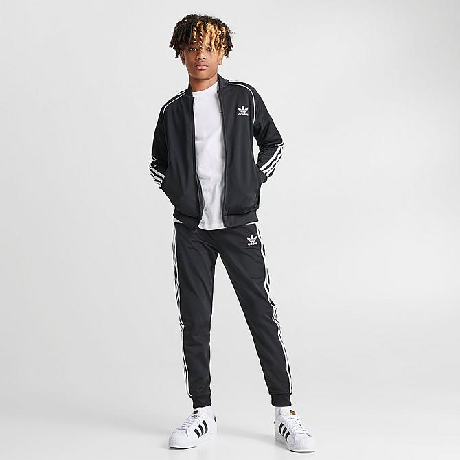 Front Three Quarter view of Kids' adidas Originals adicolor SST Track Jacket in Black/White Click to zoom