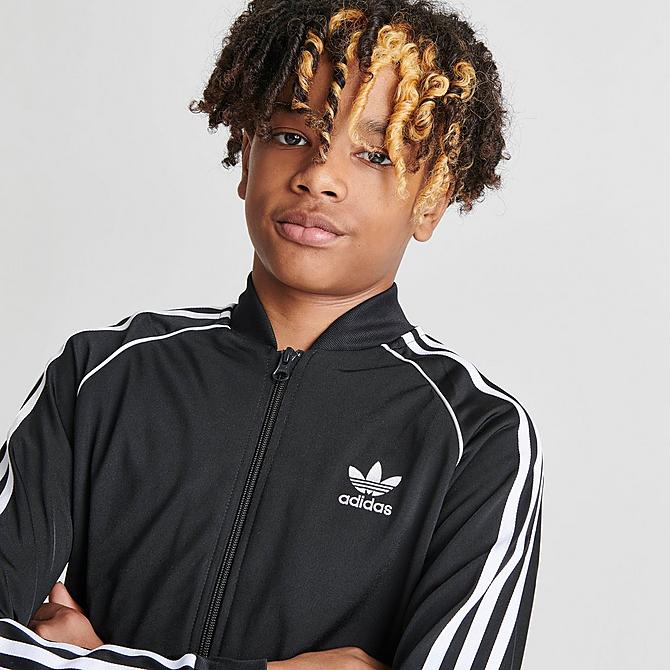 On Model 5 view of Kids' adidas Originals adicolor SST Track Jacket in Black/White Click to zoom