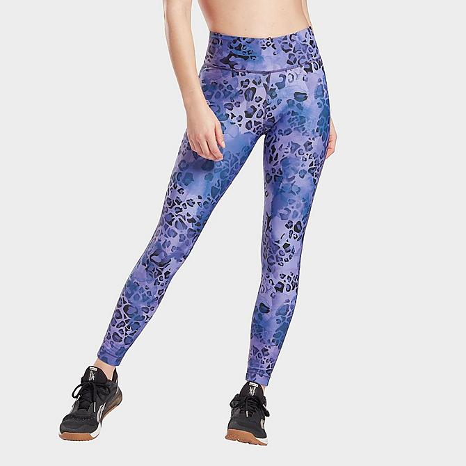 Front Three Quarter view of Women's Reebok Modern Safari Lux Bold Training Tights in Vector Navy/Hyper Purple Click to zoom