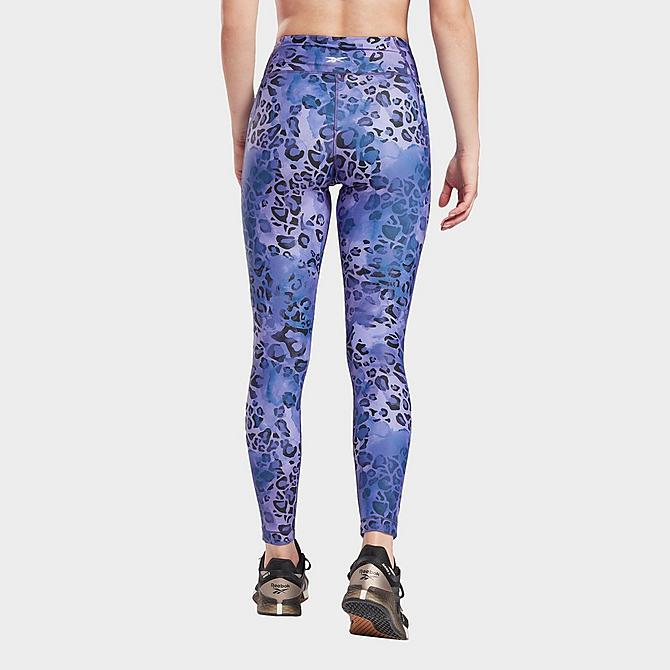 Back Left view of Women's Reebok Modern Safari Lux Bold Training Tights in Vector Navy/Hyper Purple Click to zoom
