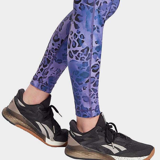 Back Right view of Women's Reebok Modern Safari Lux Bold Training Tights in Vector Navy/Hyper Purple Click to zoom