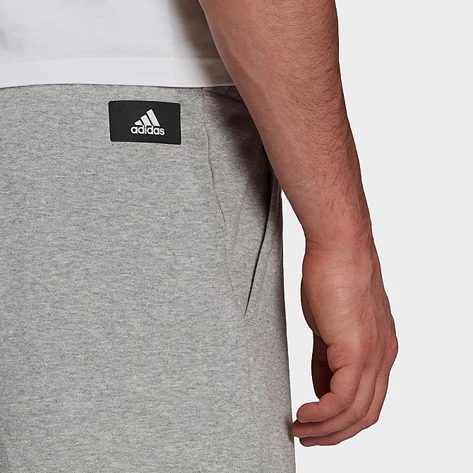 On Model 5 view of Men's adidas Sportswear Future Icons 3 Bar Graphic Shorts in Medium Grey Heather/White Click to zoom