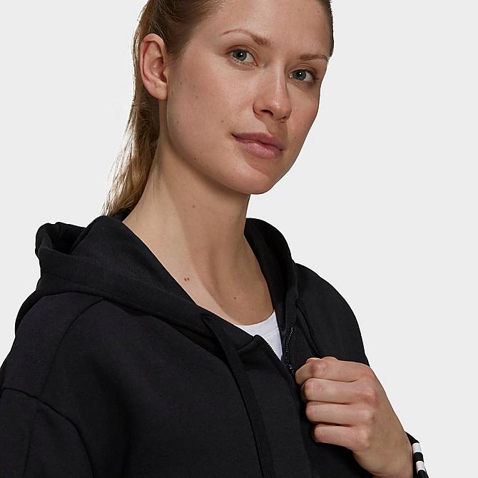 On Model 5 view of Women's adidas Essentials 3-Stripes Full-Zip Hoodie in Black/White Click to zoom
