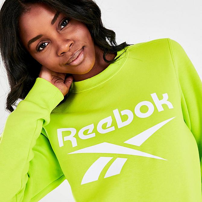 On Model 6 view of Women's Reebok Identity Logo Fleece Crew Sweatshirt in Acid Yellow/White Click to zoom
