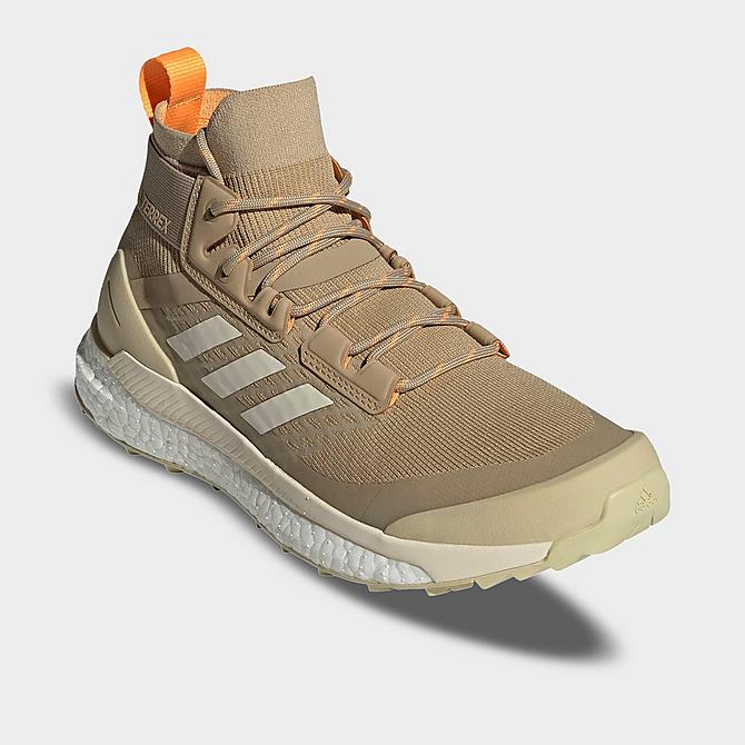 Three Quarter view of Women's adidas Terrex Free Hiker Trail Shoes in Beige Tone/Wonder White/Pulse Amber Click to zoom