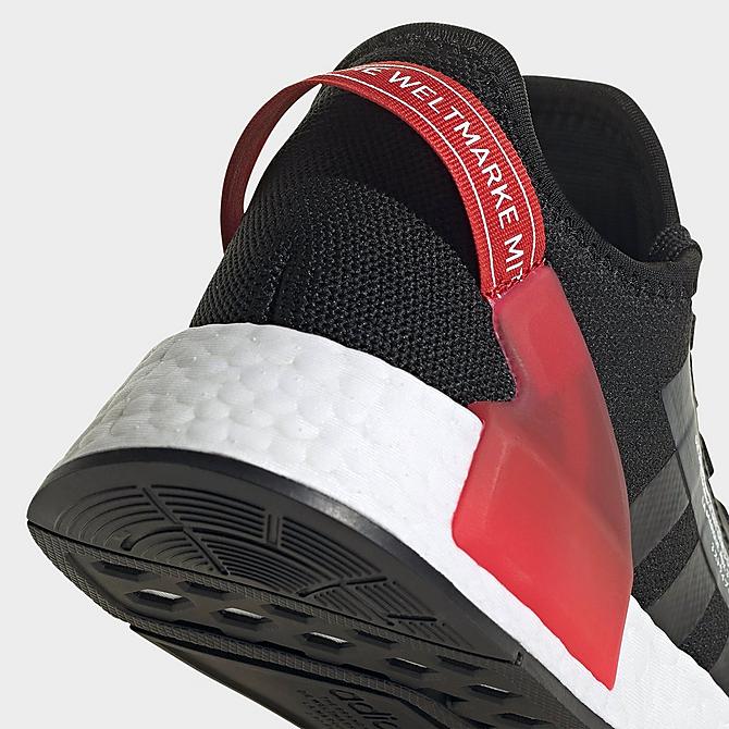 Front view of Big Kids' adidas Originals NMD_R1 V2 Casual Shoes in Core Black/Cloud White/Red/Blue Click to zoom