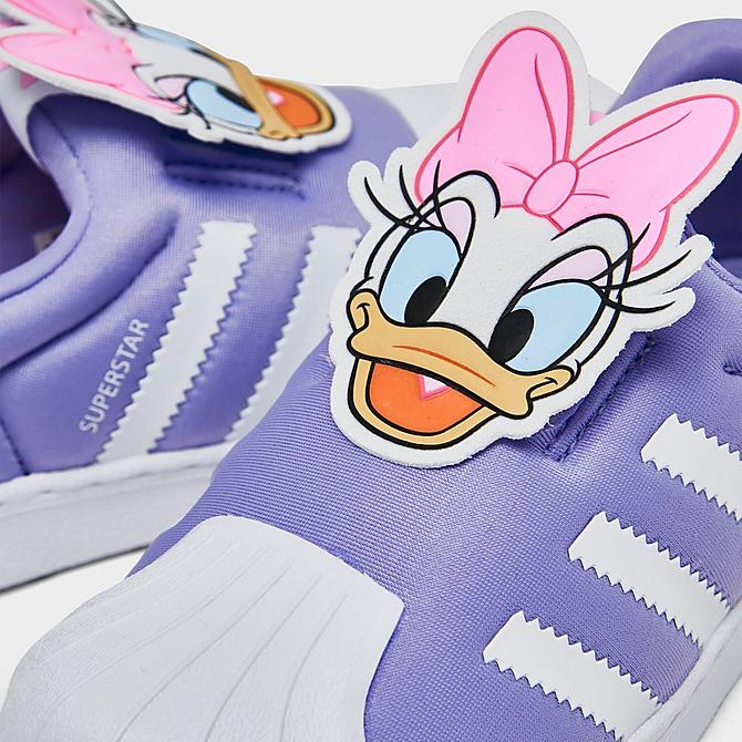 Front view of Girls' Toddler adidas Originals Disney Daisy Duck Superstar 360 Casual Shoes in Cloud White/Light Purple Click to zoom