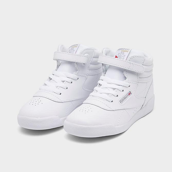 Three Quarter view of Girls' Toddler Reebok Freestyle Hi Casual Shoes in White/White/White Click to zoom