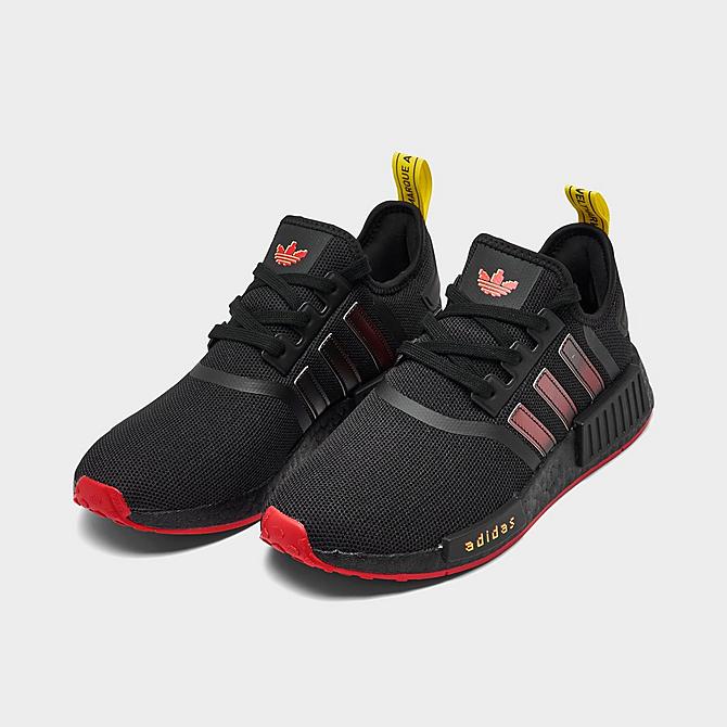 Three Quarter view of Big Kids' adidas Originals NMD R1 Casual Shoes in Black/Red/Yellow Click to zoom