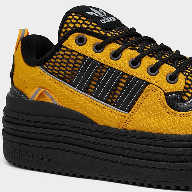 Front view of Women's adidas Originals Triple Platforum Low Casual Shoes in Crew Yellow/Core Black/Silver Metallic Click to zoom