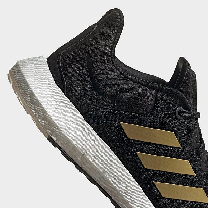 Left view of Women's adidas Pureboost 21 Running Shoes in Black/Gold Metallic/Grey Click to zoom