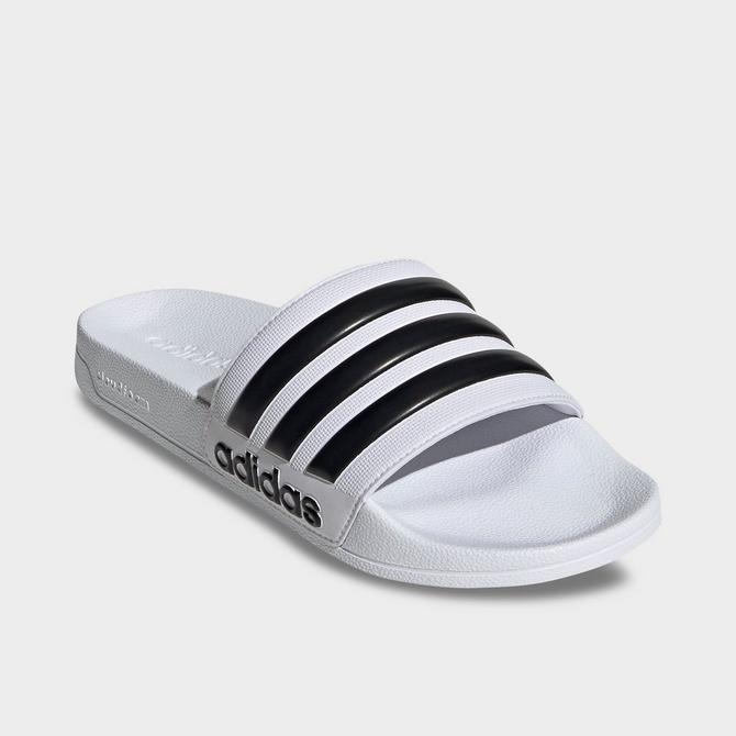 Three Quarter view of Men's adidas adilette Shower Slide Sandals in White/Black/White Click to zoom