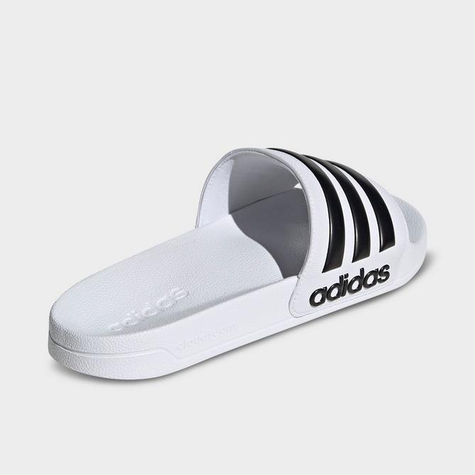 Left view of Men's adidas adilette Shower Slide Sandals in White/Black/White Click to zoom