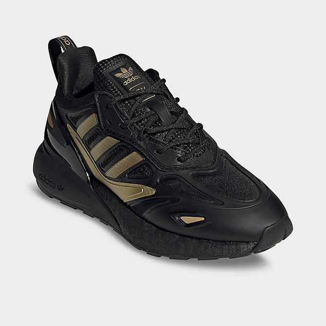 Three Quarter view of Boys' Big Kids' adidas Originals ZX 2K BOOST 2.0 Casual Shoes in Black/Black/Gold Metallic Click to zoom