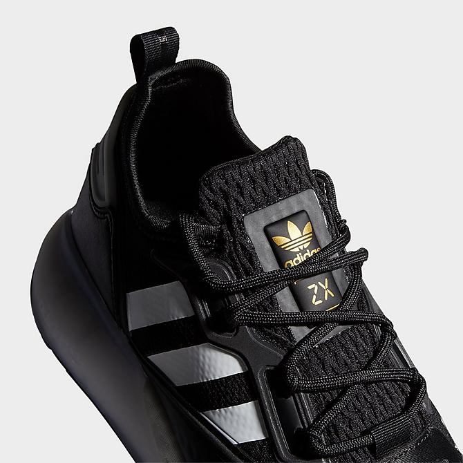 Front view of Women's adidas Originals ZX 2K BOOST Running Shoes in Black/White/Gold Metallic Click to zoom
