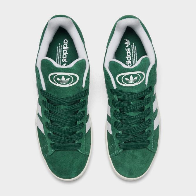 White adidas sneakers with green clearance back