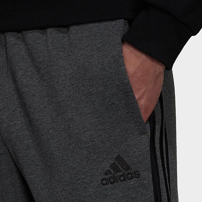 Back Right view of Men's adidas 3-Stripes Essentials Open Hem Fleece Pants in Dark Grey Heather/Black Click to zoom