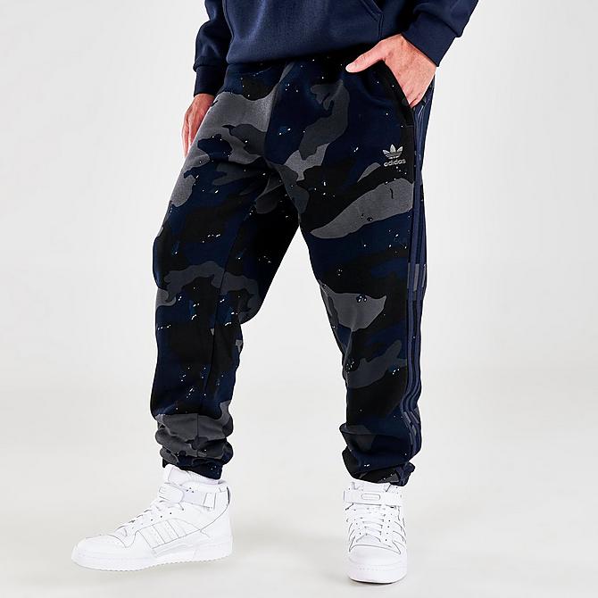 Front Three Quarter view of Men's adidas Originals 3-Stripes Camo Jogger Pants in Night Navy Click to zoom