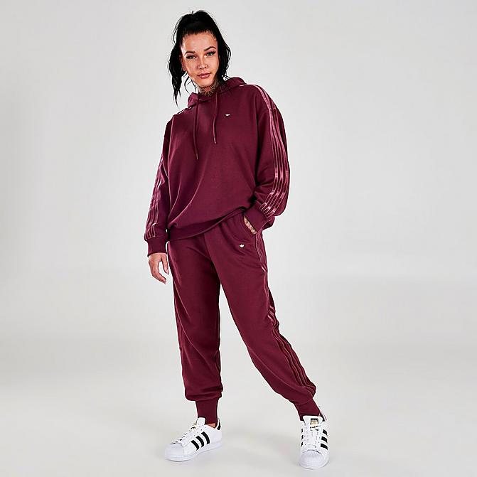 Front view of Women's adidas Originals Velvet Stripes with Trefoil Rivet Cuffed Pants in Victory Crimson Click to zoom