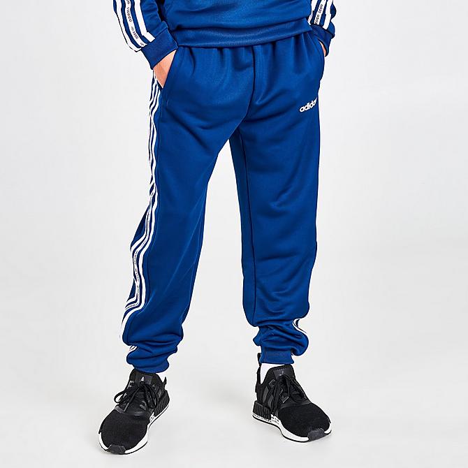 Front Three Quarter view of Boys' adidas Originals Tape Jogger Pants in Blue/White Click to zoom