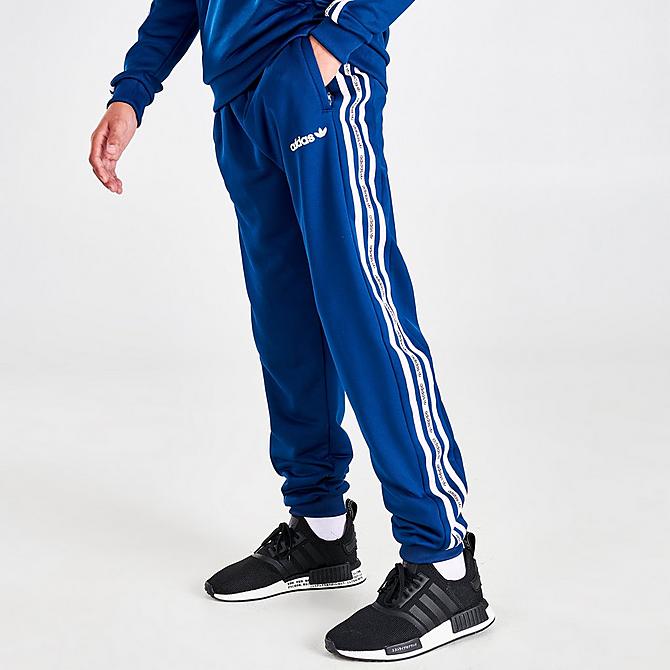 Back Left view of Boys' adidas Originals Tape Jogger Pants in Blue/White Click to zoom