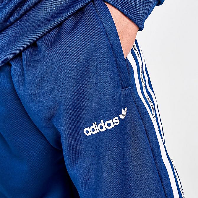 On Model 6 view of Boys' adidas Originals Tape Jogger Pants in Blue/White Click to zoom