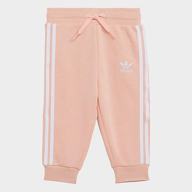 [angle] view of Kids' Infant and Toddler adidas Originals Trefoil Pullover Hoodie and Jogger Pants Set in Haze Coral/White Click to zoom