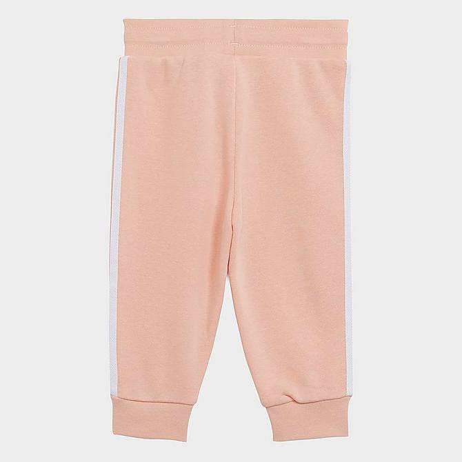 [angle] view of Kids' Infant and Toddler adidas Originals Trefoil Pullover Hoodie and Jogger Pants Set in Haze Coral/White Click to zoom