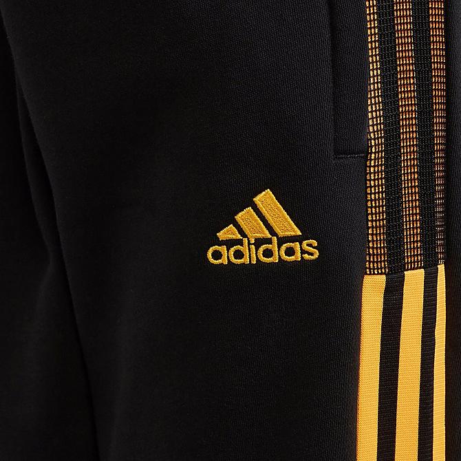 Back Right view of Kids' adidas Tiro Winterized Track Pants in Black/Solar Gold Click to zoom