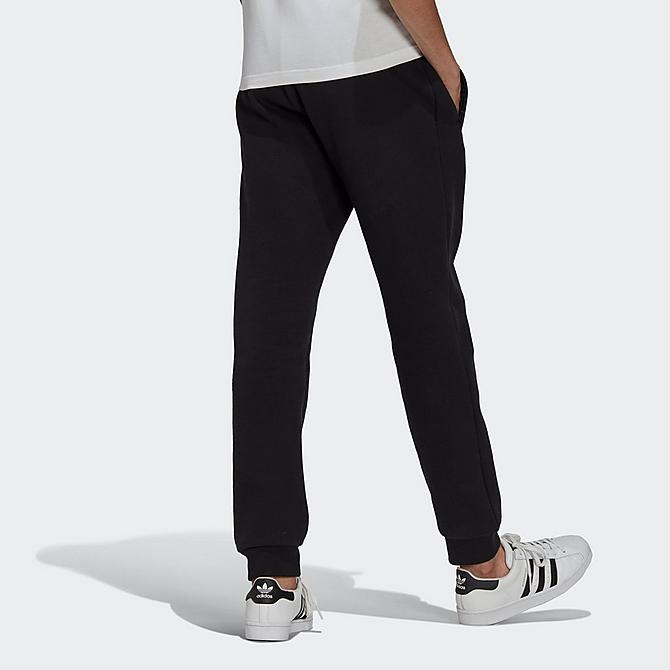 Front Three Quarter view of Men's adidas Originals Adicolor Essentials Trefoil Pants in Black Click to zoom