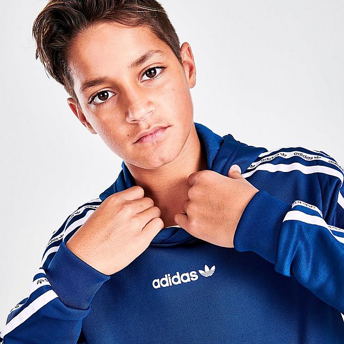 On Model 6 view of Kids' adidas Tape Pullover Hoodie in Blue/White Click to zoom