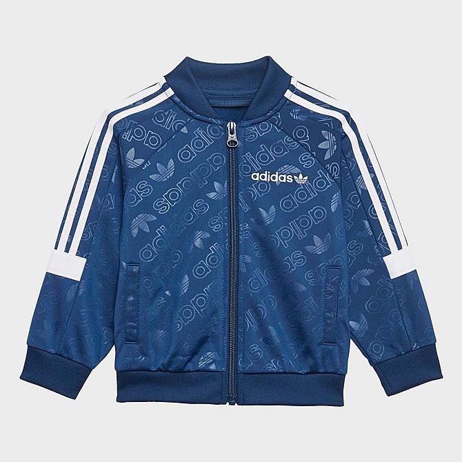 Front Three Quarter view of Boys' Infant and Toddler adidas Originals SST Track Jacket and Pants Set in Mystery Blue Click to zoom