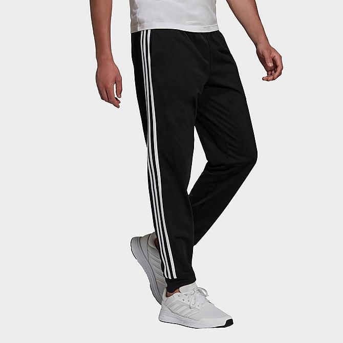 Back Left view of Men's adidas Warm-Up Tricot Tapered 3-Stripe Training Pants in Black/White Click to zoom