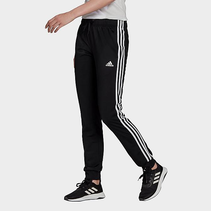 Front view of Women's adidas Essentials Primegreen Tapered Warm-Up Track Pants in Black Click to zoom
