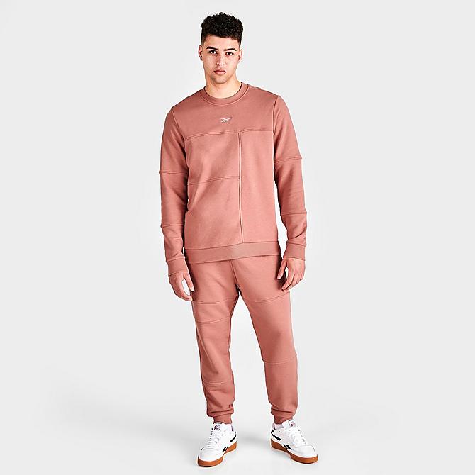 Front Three Quarter view of Men's Reebok MYT Minimal Waste Jogger Pants in Canyon Coral Click to zoom