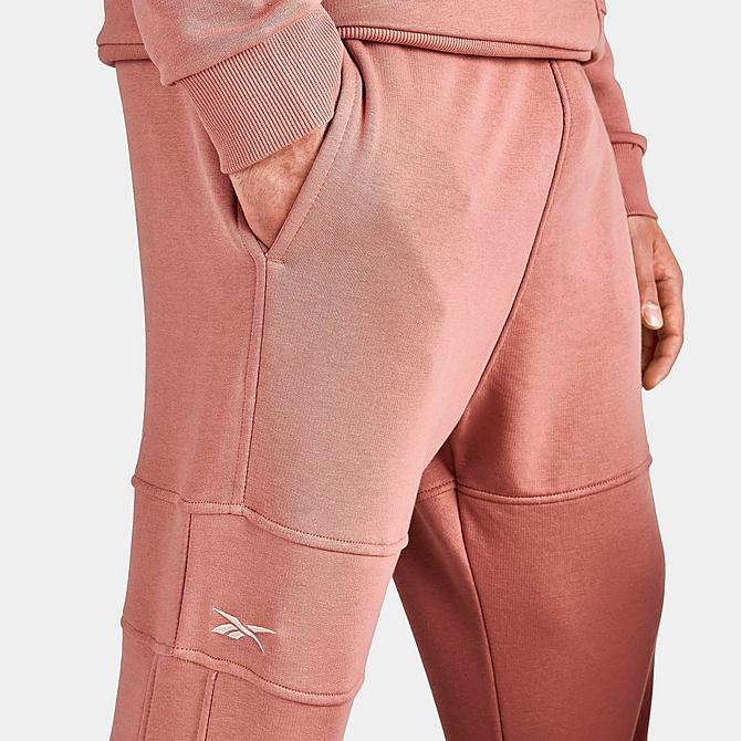 On Model 5 view of Men's Reebok MYT Minimal Waste Jogger Pants in Canyon Coral Click to zoom