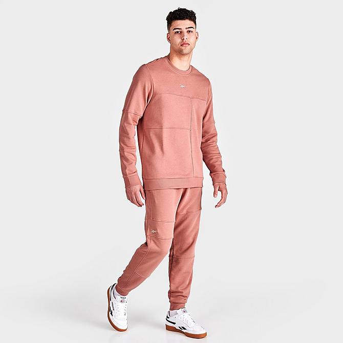 Front Three Quarter view of Reebok MYT Minimal Waste Crewneck Sweatshirt in Canyon Coral Click to zoom