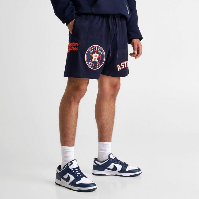 [angle] view of Men's Pro Standard Houston Astros MLB Souvenir Mesh Shorts in Navy/Orange Click to zoom