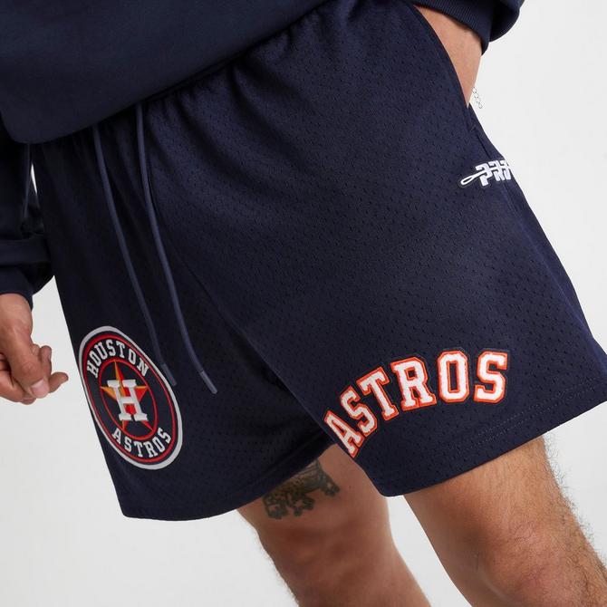 [angle] view of Men's Pro Standard Houston Astros MLB Souvenir Mesh Shorts in Navy/Orange Click to zoom