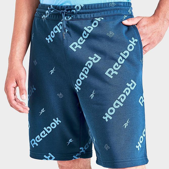 On Model 5 view of Men's Reebok Identity All-Over Print Shorts in Batik Blue Click to zoom
