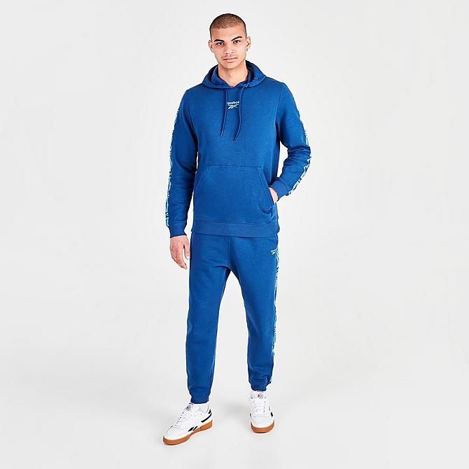 Front Three Quarter view of Men's Reebok Identity Tape Pullover Hoodie in Batik Blue Click to zoom