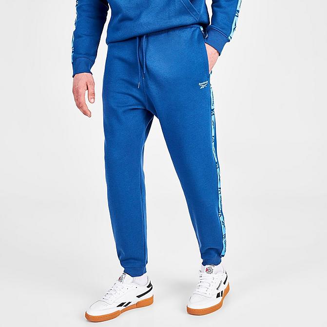 Front view of Men's Reebok Identity Tape Jogger Pants in Batik Blue Click to zoom