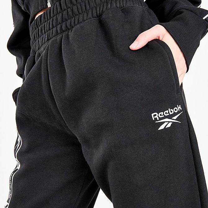 On Model 5 view of Women's Reebok Essentials Taped Logo Pants in Black Click to zoom