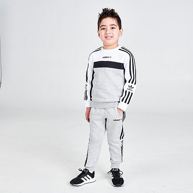 Front view of Little Kids' adidas Originals Itasca Crewneck Sweatshirt and Jogger Pants Set in Heather Grey Click to zoom