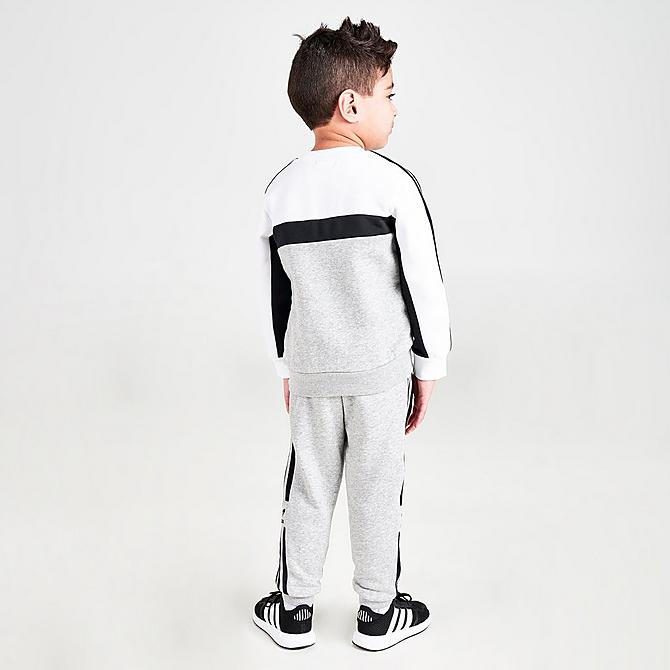 Front Three Quarter view of Little Kids' adidas Originals Itasca Crewneck Sweatshirt and Jogger Pants Set in Heather Grey Click to zoom