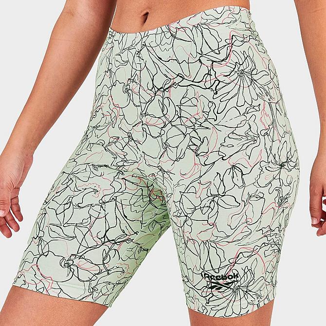 On Model 5 view of Women's Reebok Classics Contour Floral Print Legging Shorts in Light Sage Click to zoom