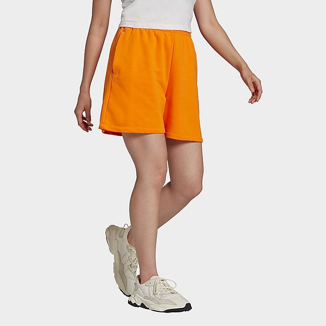 On Model 5 view of Women's adidas Originals Adicolor Essentials French Terry Shorts in Bright Orange Click to zoom