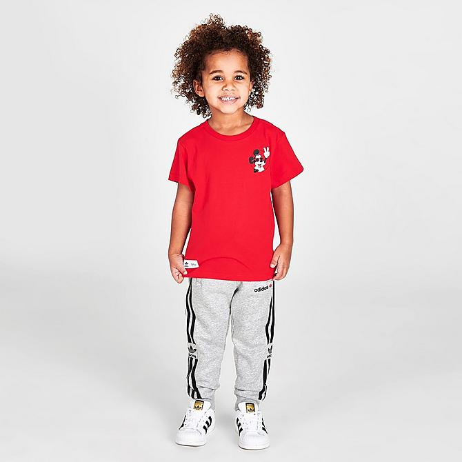 Front Three Quarter view of Little Kids' adidas Originals x Disney Mickey and Friends T-Shirt in Vivid Red Click to zoom